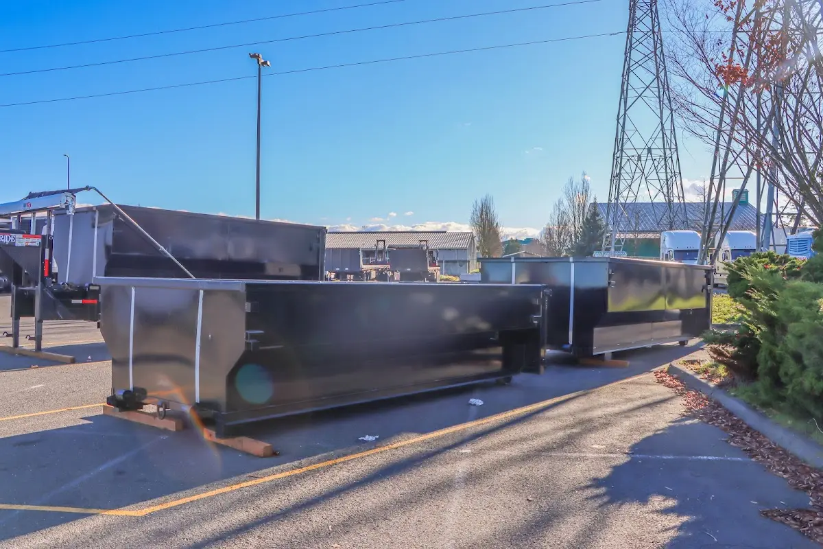 Roll-off dumpster ready for waste disposal at job site for 12 Yard Dumpster Rental in Ensley